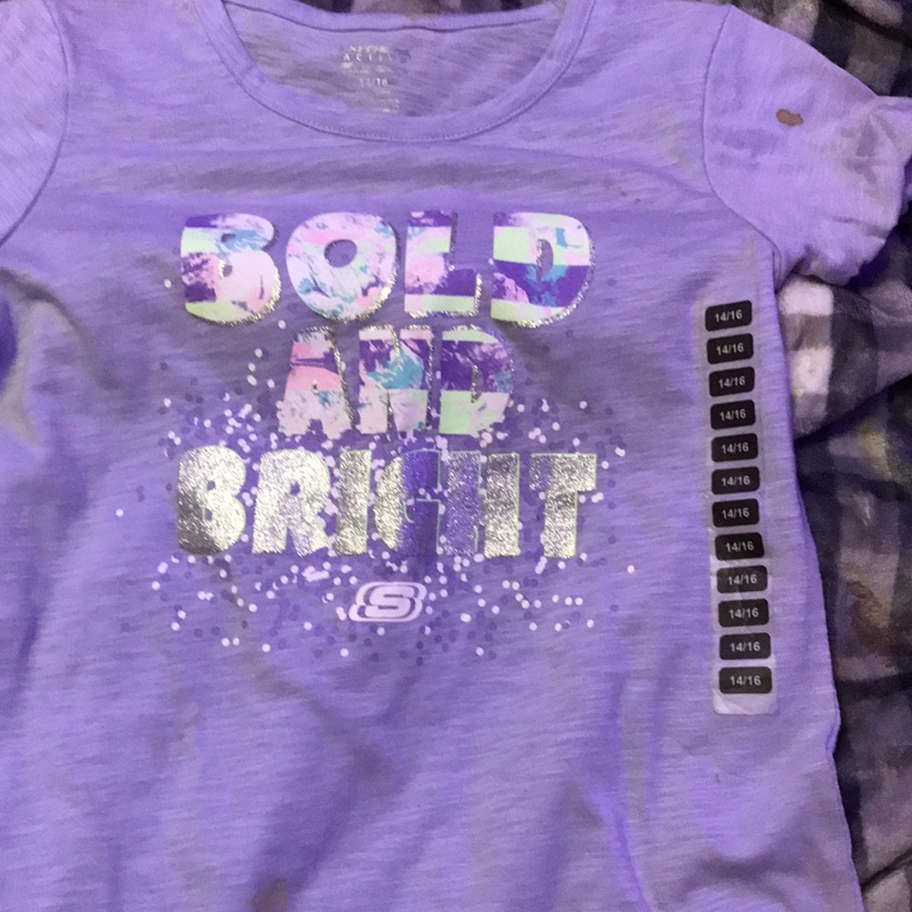 It’s a girls kids shirt 14/16